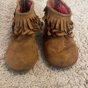 Size 4 fringe booties . Zip back